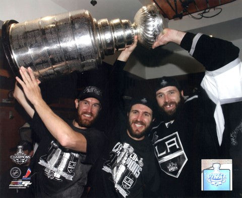 Jeff Carter, Mike Richards, & Dustin Penner with the Stanley Cup Trophy after Winning Game 6 of the 2012 Stanley Cup Finals