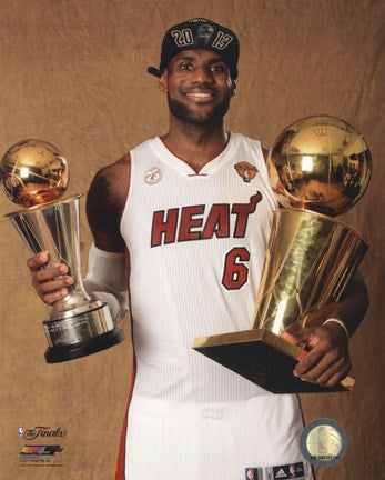 LeBron James with the NBA Championship & MVP Trophies Game 7 of the 2013 NBA Finals