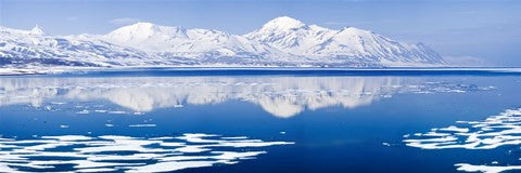 Reflection of a mountain range in an ocean, Bellsund, Spitsbergen, Svalbard Islands, Norway