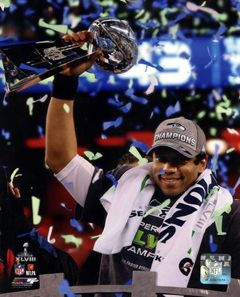 Russell Wilson with the Vince Lombardi Trophy Super Bowl XLVIII