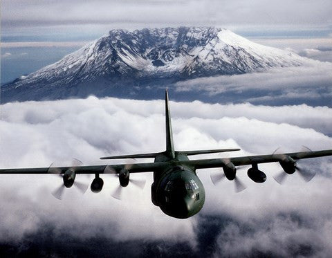 A C-130 Hercules aircraft flies over Mount St. Helens, Vancouver, Washington