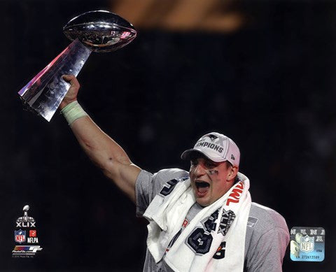 Rob Gronkowski with the Vince Lombardi Trophy Super Bowl XLIX